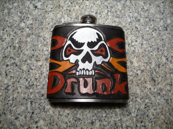 LeatherGirl Hand Carved Drunk Skull with Flames Flask.  Dyed Black.  Painted Skull with Red and Orange Flames.  Red Lettering.